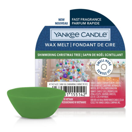Grünes Wax Melt vor geöffneter Yankee Candle Verpackung