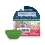 Grünes Wax Melt vor geöffneter Yankee Candle Verpackung
