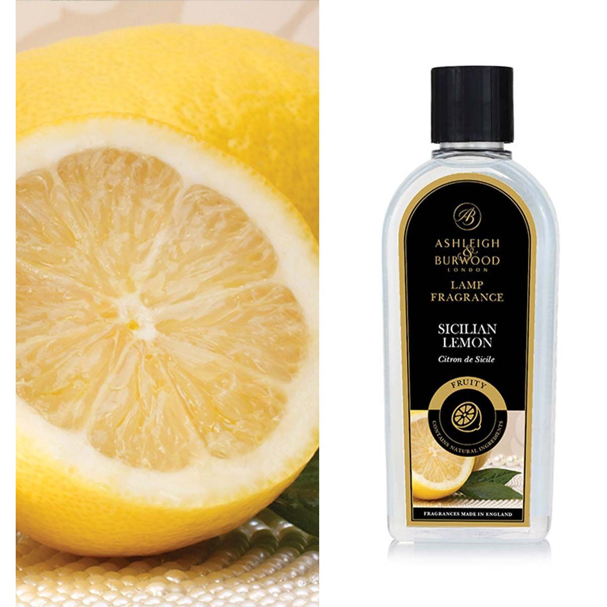 Sicilian Lemon Lamp Fragrance Flasche Ashleigh & Burwood Sicilian Lemon neben aufgeschnittener Zitrone
