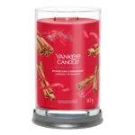Rote Sparkling Cinnamon Kerze auf grauem Standfuß mit zwei Dochten