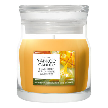 Yankee Candle Starfruit & Sunshine Duftkerze im Glas vor weißem Hintergrund