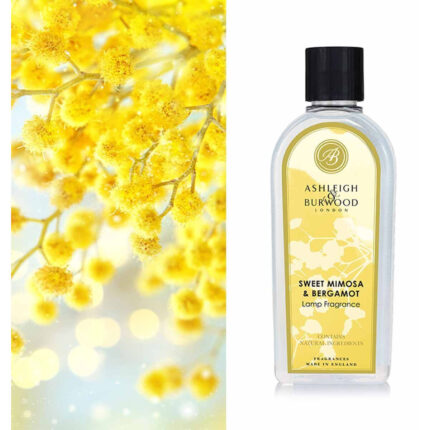 Flasche Sweet Mimosa & Bergamot Lamp Fragrance vor gelben Blüten
