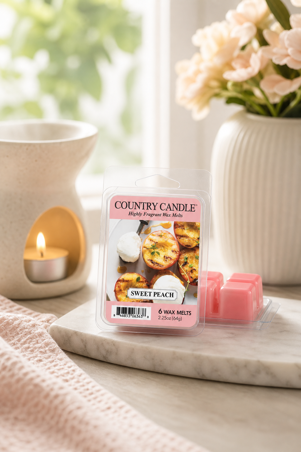 Sweet Peach Wax Melts 64g – Stimmungsbild Sweet Peach Wax Melts 64g in einer stimmungsvollen Anwendungsszene