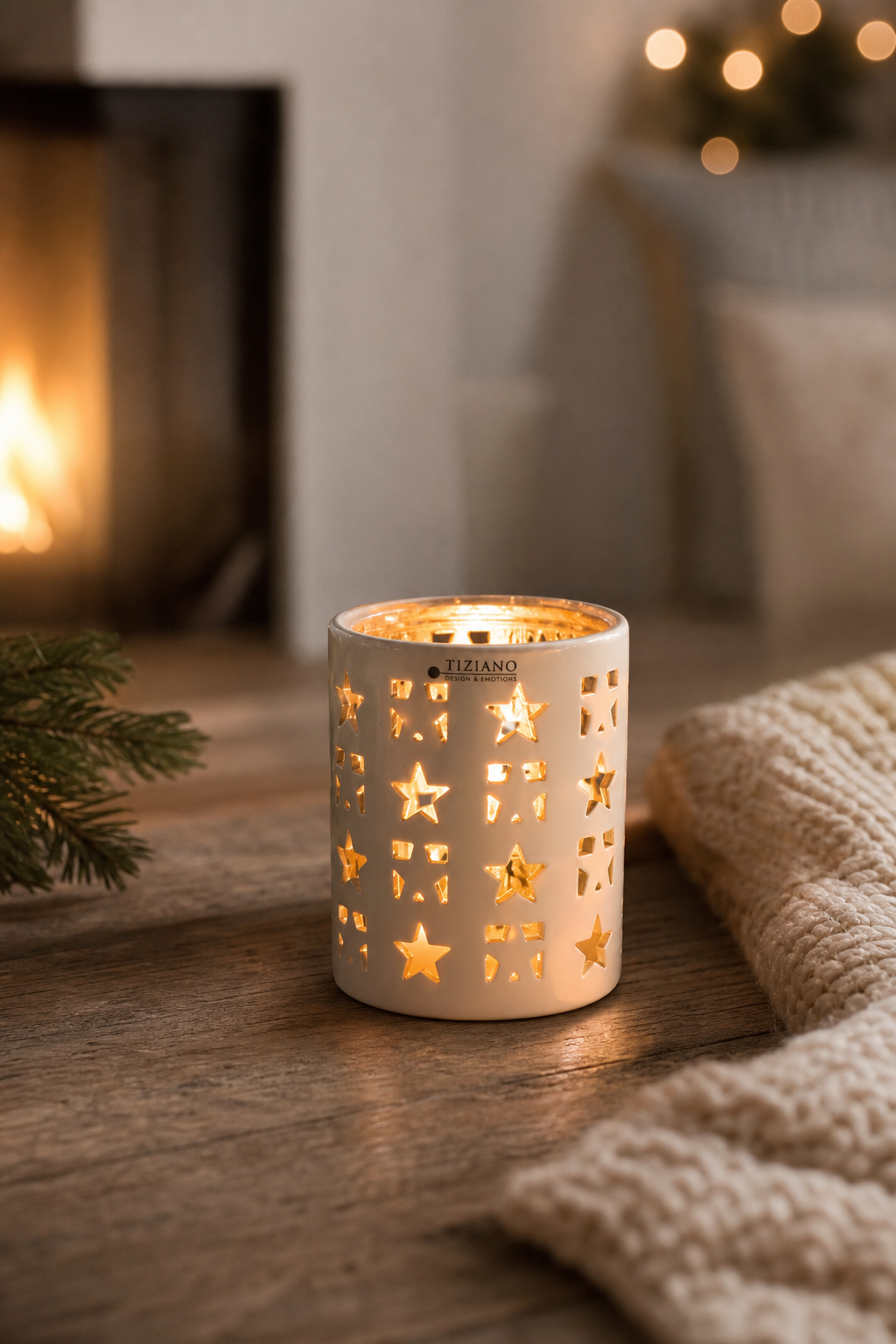Tischlicht Atella Stern 7cm creme/gold in einer stimmungsvollen Anwendungsszene