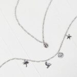 Silberfarbene Fußkette mit Stern-, Muschel-, Palme- und Flamingoanhängern