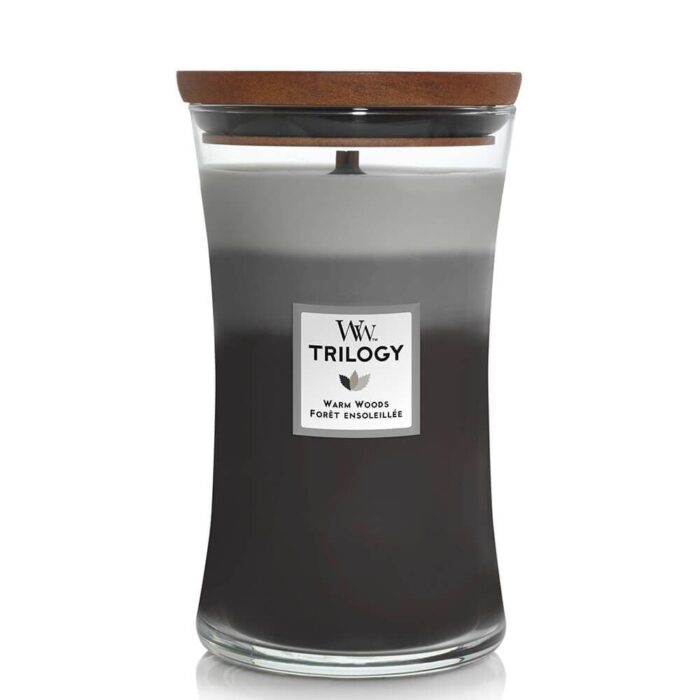 WoodWick Trilogy Warm Woods Kerze mit Deckel und sichtbarem Etikett